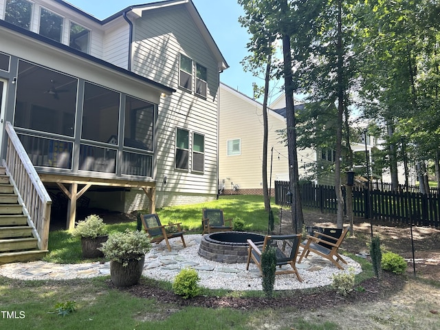 127 Sanderway Dr, Chapel Hill, NC 27516 - view of yard with an outdoor fire pit, a sunroom, and stairway
