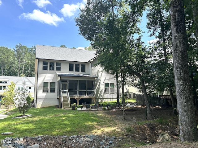 127 Sanderway Dr, Chapel Hill, NC 27516 - back of house featuring a sunroom, stairs, and a patio