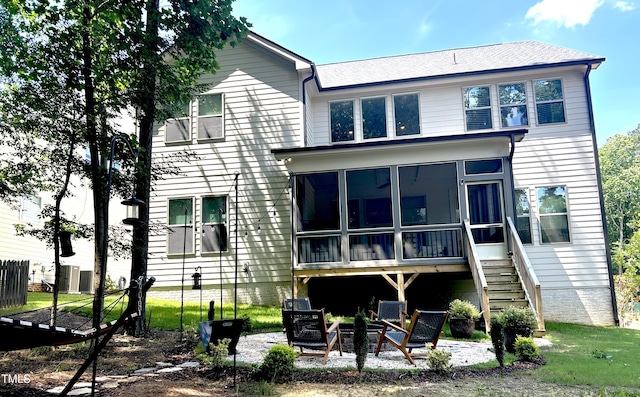 127 Sanderway Dr, Chapel Hill, NC 27516 - rear view of property featuring a sunroom and a patio