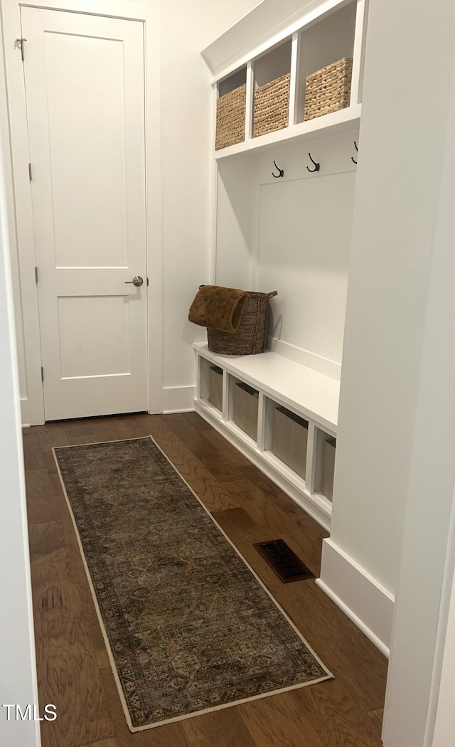127 Sanderway Dr, Chapel Hill, NC 27516 - mudroom with dark wood-type flooring and baseboards