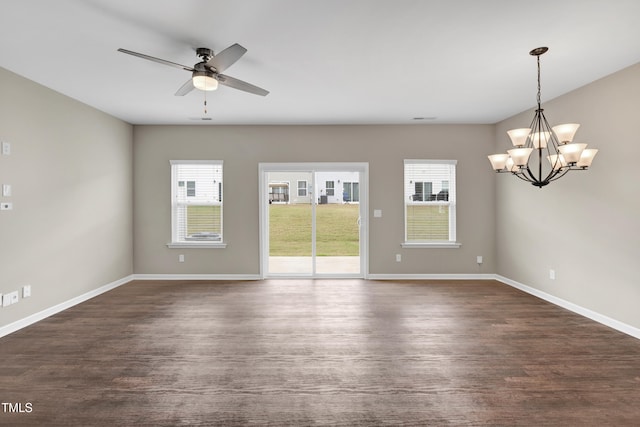 41 Willow Green Dr, Clayton, NC 27527 - spare room with dark wood-type flooring, baseboards, and ceiling fan with notable chandelier