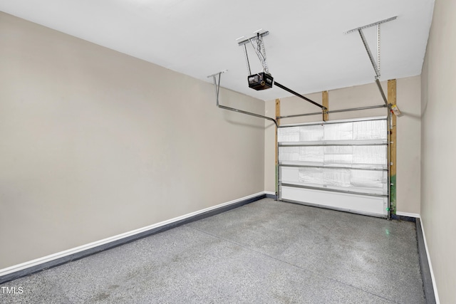 41 Willow Green Dr, Clayton, NC 27527 - garage featuring baseboards and a garage door opener