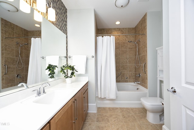 full bath featuring vanity, recessed lighting, shower / tub combo with curtain, tile patterned flooring, and toilet