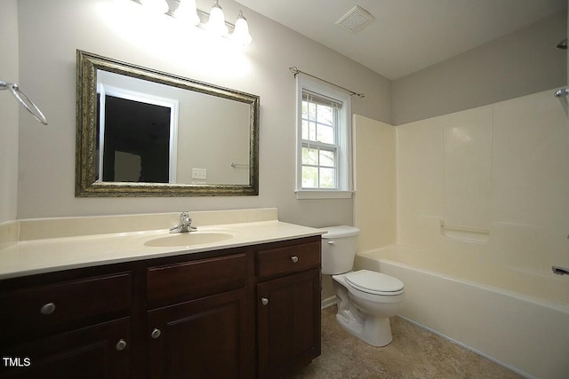 bathroom featuring visible vents, toilet, shower / bathing tub combination, and vanity
