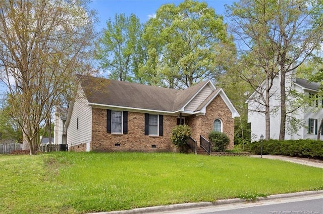 single story home featuring a front yard, brick siding, crawl space, and a shingled roof
