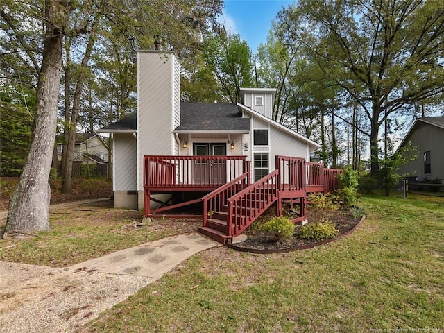 494 Wilder Dr, Fayetteville, NC 28314 - back of house featuring a wooden deck, stairway, a lawn, a chimney, and a shingled roof
