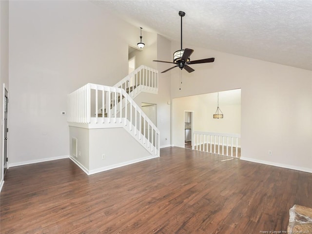 494 Wilder Dr, Fayetteville, NC 28314 - unfurnished living room with baseboards, a textured ceiling, wood finished floors, and ceiling fan