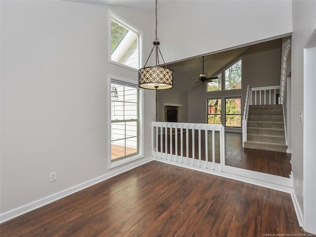 494 Wilder Dr, Fayetteville, NC 28314 - unfurnished dining area with high vaulted ceiling, plenty of natural light, and baseboards