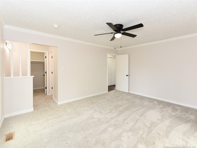 494 Wilder Dr, Fayetteville, NC 28314 - spare room with carpet, ornamental molding, and ceiling fan