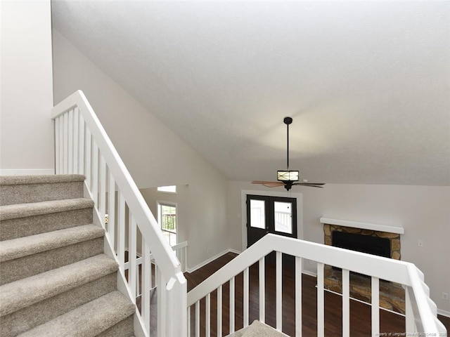 494 Wilder Dr, Fayetteville, NC 28314 - stairs with baseboards, a ceiling fan, wood finished floors, and vaulted ceiling