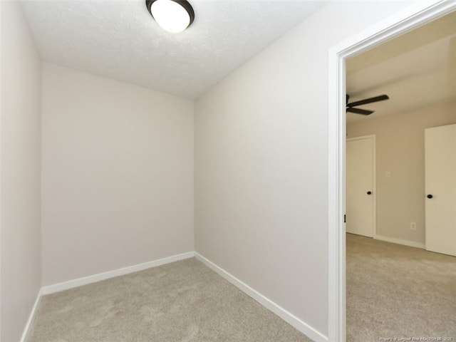 494 Wilder Dr, Fayetteville, NC 28314 - spare room featuring light carpet, baseboards, and ceiling fan