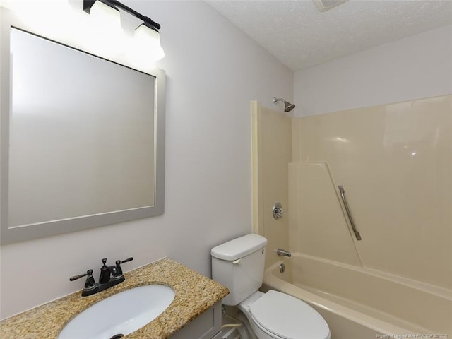 494 Wilder Dr, Fayetteville, NC 28314 - full bath featuring toilet, a textured ceiling, vanity, and shower / bathtub combination