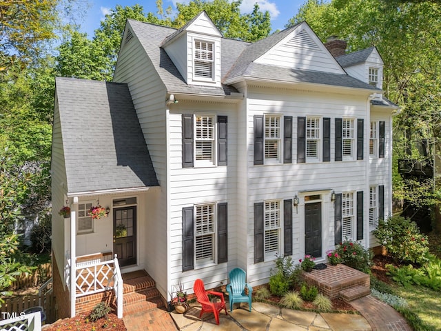 2520 Ashley Ct, Raleigh, NC 27607 - view of front of house with roof with shingles and a chimney