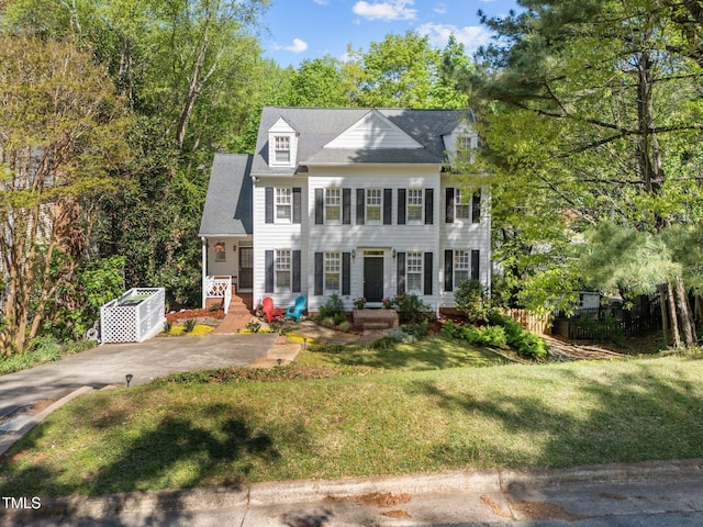 2520 Ashley Ct, Raleigh, NC 27607 - colonial inspired home with a front yard and fence