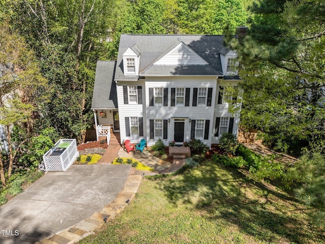 2520 Ashley Ct, Raleigh, NC 27607 - colonial house featuring a front yard and fence