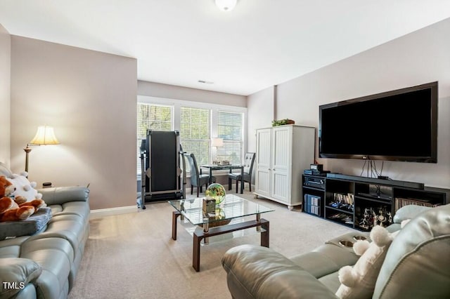 12808 Edsel Dr, Raleigh, NC 27613 - living room featuring light colored carpet and baseboards