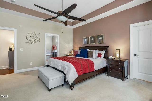12808 Edsel Dr, Raleigh, NC 27613 - bedroom featuring carpet flooring, baseboards, ensuite bath, and ceiling fan