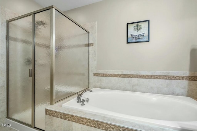 12808 Edsel Dr, Raleigh, NC 27613 - bathroom with a shower stall and a garden tub
