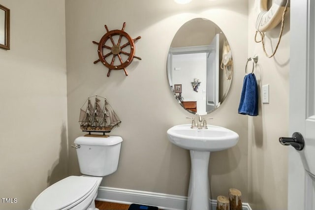 12808 Edsel Dr, Raleigh, NC 27613 - bathroom with toilet and a sink