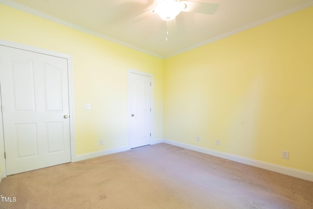 627 Carraway Dr, Graham, NC 27253 - unfurnished bedroom with a ceiling fan, light carpet, baseboards, and ornamental molding