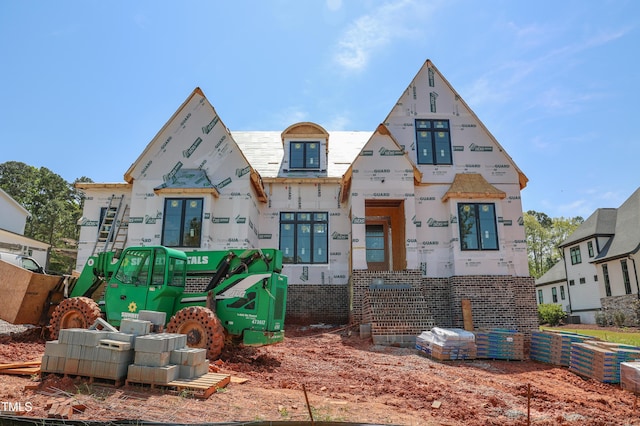 view of front facade featuring playground community