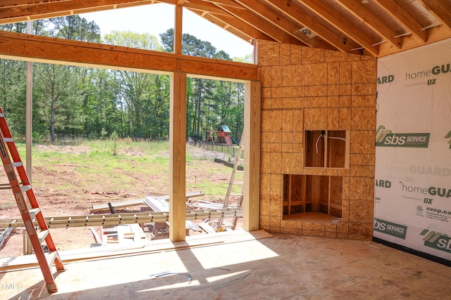 entryway featuring vaulted ceiling