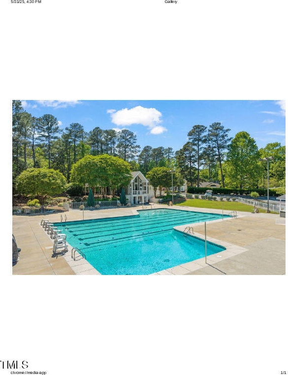 2036 Metacomet Way, Raleigh, NC 27604 - community pool featuring a patio area and view of scattered trees