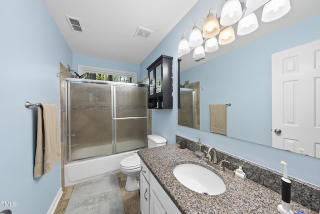 full bathroom featuring combined bath / shower with glass door, vanity, visible vents, and toilet