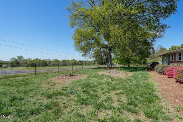 view of yard with fence