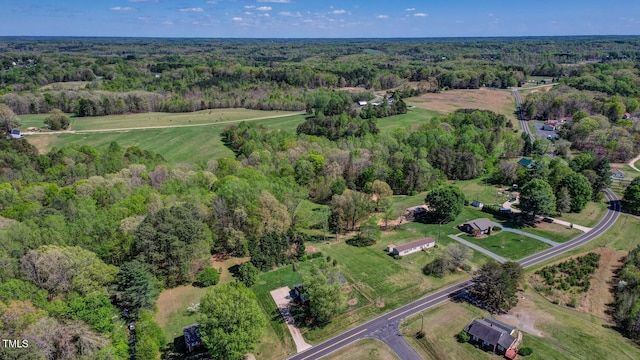 aerial view featuring a forest view