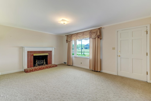 unfurnished living room with a fireplace, carpet flooring, baseboards, and crown molding