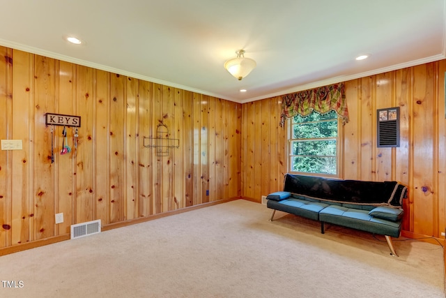sitting room with recessed lighting, ornamental molding, visible vents, and carpet floors