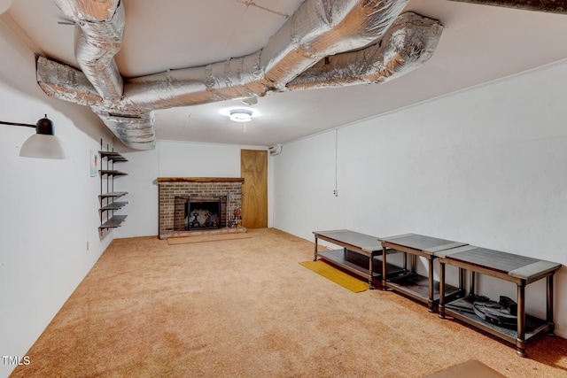finished basement with a fireplace and carpet floors
