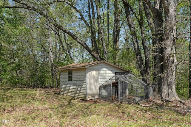 view of outbuilding with an outdoor structure