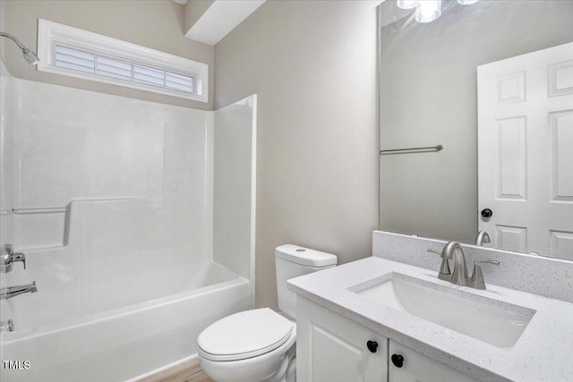 full bath featuring toilet, shower / tub combination, and vanity