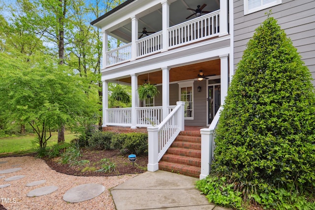 3332 Cheswick Dr, Raleigh, NC 27609 - doorway to property featuring covered porch, a ceiling fan, and a balcony