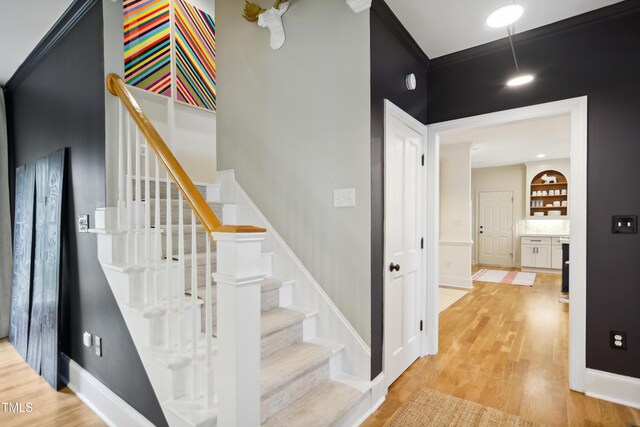 3332 Cheswick Dr, Raleigh, NC 27609 - staircase featuring baseboards and wood finished floors