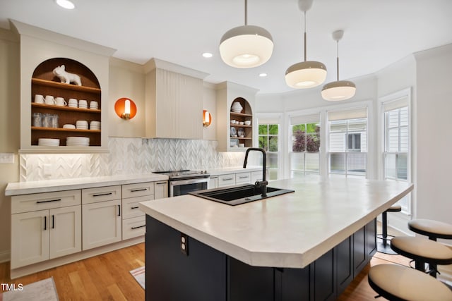 3332 Cheswick Dr, Raleigh, NC 27609 - kitchen with a sink, light countertops, open shelves, and stainless steel electric range