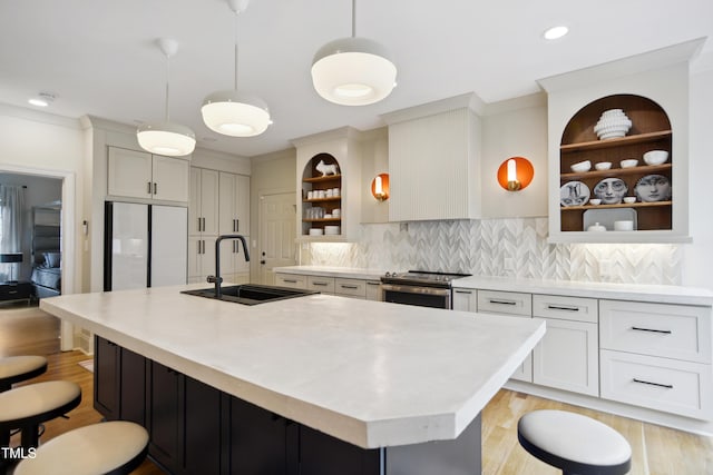 3332 Cheswick Dr, Raleigh, NC 27609 - kitchen featuring white fridge, open shelves, a sink, light countertops, and stainless steel electric stove