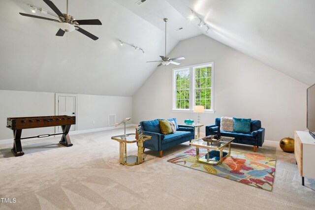 3332 Cheswick Dr, Raleigh, NC 27609 - interior space featuring rail lighting, carpet, vaulted ceiling, and ceiling fan