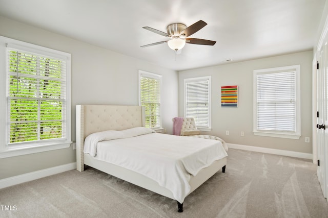 3332 Cheswick Dr, Raleigh, NC 27609 - carpeted bedroom with visible vents, baseboards, and ceiling fan