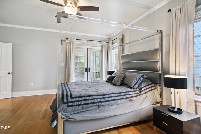 3332 Cheswick Dr, Raleigh, NC 27609 - bedroom with baseboards, ceiling fan, crown molding, wood finished floors, and access to exterior