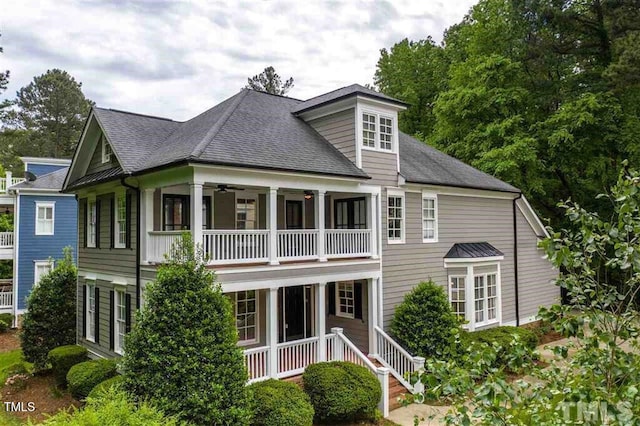 3332 Cheswick Dr, Raleigh, NC 27609 - back of house featuring a porch, roof with shingles, ceiling fan, and a balcony