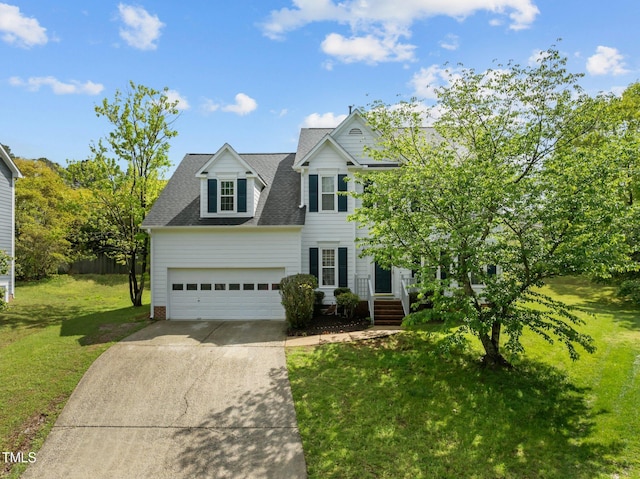 view of front facade featuring a front yard, a shingled roof, a garage, fence, and driveway