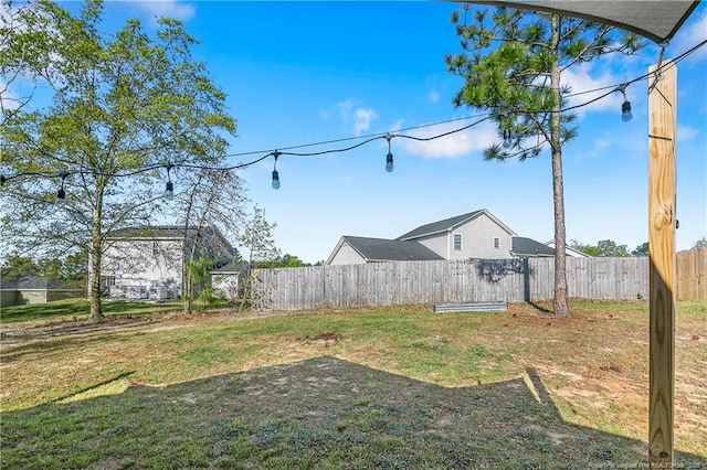 view of yard with fence