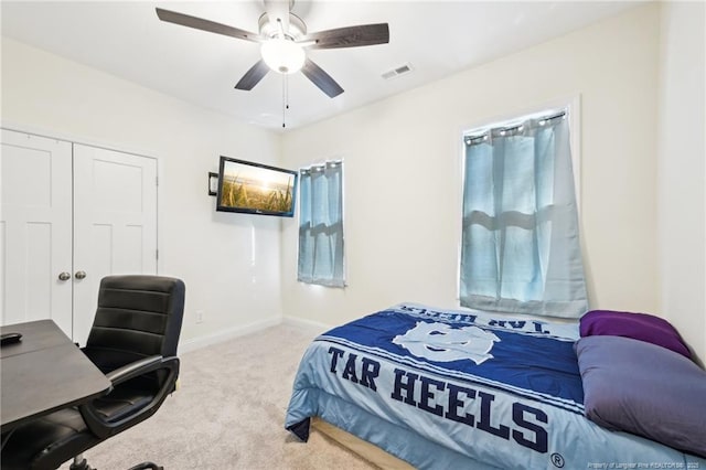 2140 Smith Rd, Hope Mills, NC 28348 - carpeted bedroom featuring a closet, ceiling fan, baseboards, and visible vents
