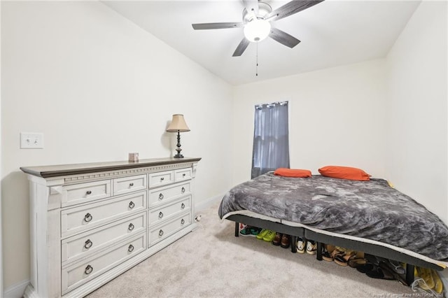 2140 Smith Rd, Hope Mills, NC 28348 - bedroom featuring light carpet, ceiling fan, and baseboards