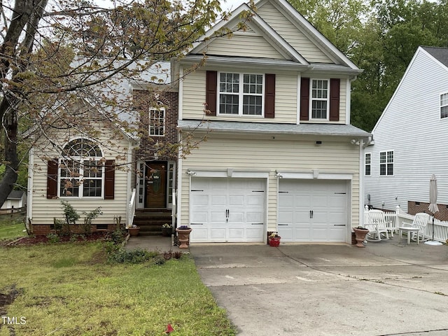 traditional home with crawl space, a garage, a front yard, and driveway