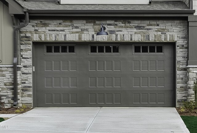 garage with driveway