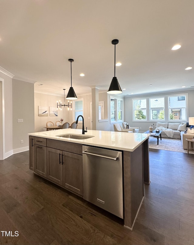kitchen with dishwasher, a sink, open floor plan, a kitchen island with sink, and dark wood-style floors